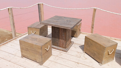 gruissan mediterranean wooden terrace of bar restaurant at the edge of pink sea water of sea salt aude France