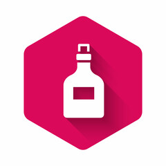 White Alcohol drink Rum bottle icon isolated with long shadow background. Pink hexagon button. Vector