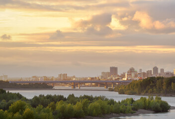 Fototapeta premium Golden clouds over the Novosibirsk