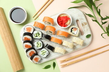Concept of tasty food with sushi rolls, top view