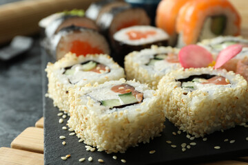 Concept of tasty food with sushi rolls, close up