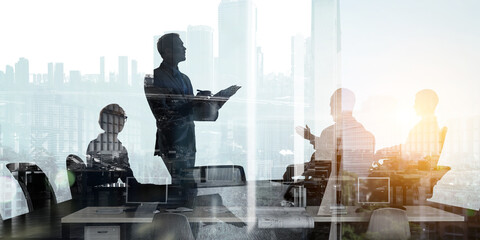 Group of business people outlines with lit background . Mixed media