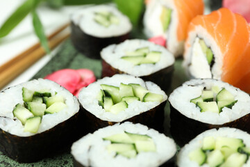 Concept of tasty food with sushi rolls, close up
