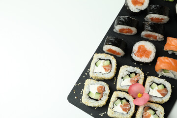 Concept of tasty food with sushi rolls, space for text