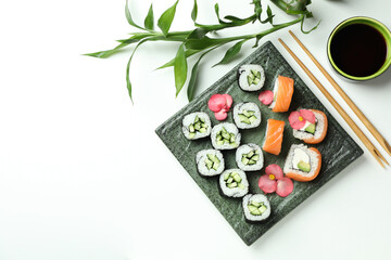 Concept of tasty food with sushi rolls, space for text