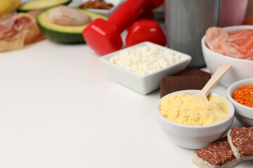 Concept of sports nutrition on white background