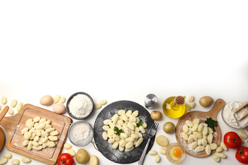 Fototapeta na wymiar Concept of cooking with potato gnocchi on white background