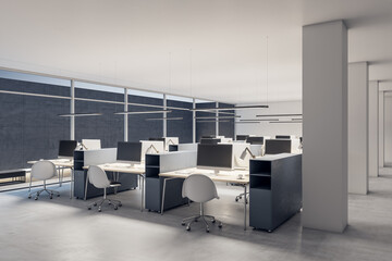 Contemporary coworking office interior with empty computer monitors on wooden desks, equipment, furniture and panoramic windows. 3D Rendering.