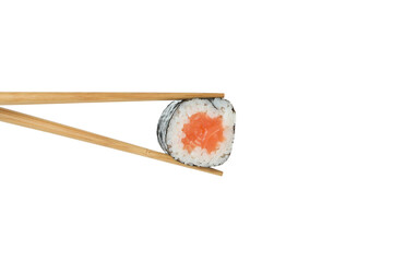 Chopsticks with maki isolated on white background © Atlas