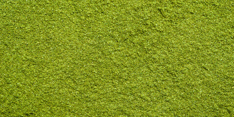 Background texture of green tea matcha powder - obrazy, fototapety, plakaty