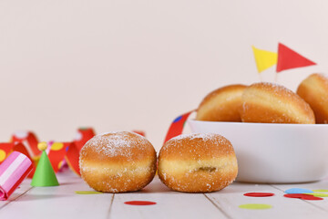 German traditional 'Berliner Pfannkuchen', a donut without hole filled with jam. Traditional served during carnival.