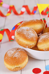 German traditional 'Berliner Pfannkuchen', a donut without hole filled with jam. Traditional served...