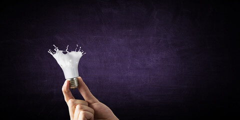 Light bulb with white glass splash