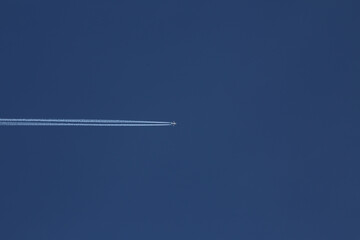 Traveler hiking in mountains clouds landscape