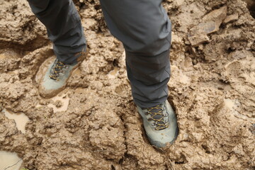 Traveler hiking in mountains clouds landscape