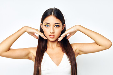 Fototapeta premium beautiful brunette long hair cosmetics posing isolated background unaltered