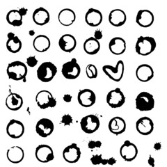 Set of black coffee stains on a white background. Set of circles, splashes, coffee stains for design. Stain in the shape of a heart, coffee grains