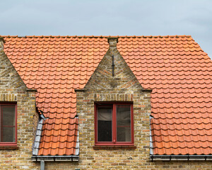 Old house dormer windows in Damme, A municipality located in the Belgian province of West Flanders, Belgium