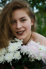 Fototapeta premium Happy girl with long hair walking in the spring