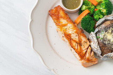 grilled salmon steak with bake potato