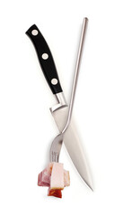 Metal fork with a bacon isolated on a white background