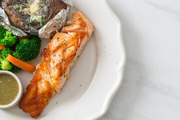 grilled salmon steak with bake potato