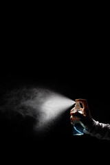 Fototapeta na wymiar Spraying Antivirus Sanitizer Spray, Hand Sanitizer Dispenser, infection control. Sanitizer to prevent Coronavirus or Covid-19. Spray bottle of Alcohol spray