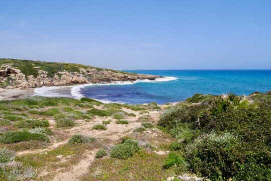 View of Calamosche beach with white sand and turquoise clear water in Riserva Naturale Oasi Faunistica di Vendicari, province Syracuse, Sicily, Italy.