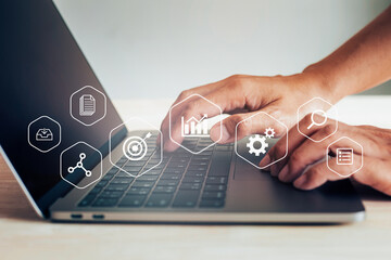 Businessman working with laptop, business analytics concept with digital data diagrams and chart, financial dashboard of company.