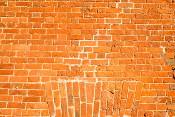 Ancient red brick wall exterior, background, wallpaper.