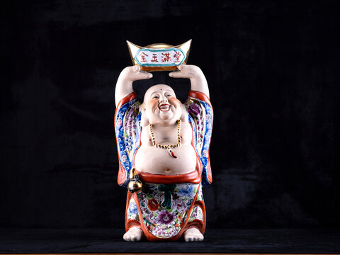Porcelain figurine of God Hotei 
