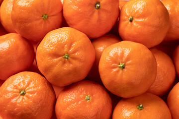 Spanish fresh sweet mandarins full frame close up as background  