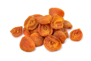 Heap of dried small sour apricots close up isolated on white background 