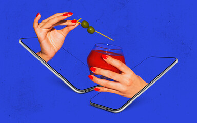 Female hands with cocktail glass sticking out phone screens isolated on bright blue neon...