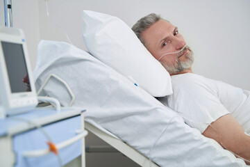 Patient undergoing oxygen therapy in healthcare facility