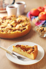 Apple pie with walnuts - typical autumn dish	
