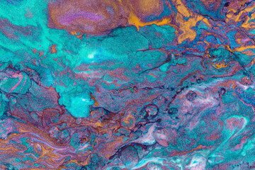 Fototapeta na wymiar Abstract colored background from liquid flowing paints