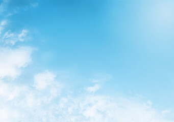 Light fluffy clouds with sun on the sky soft focus. Heavenly clouds background in summer day. Concept of freedom, relaxation, ecology. Copy space. Empty space.