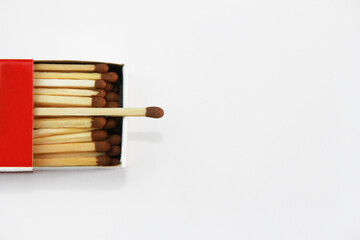 wooden matches for lighting a fire in a paper box