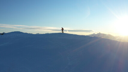 Mountaineer backcountry ski walking ski alpinist in the mountains.