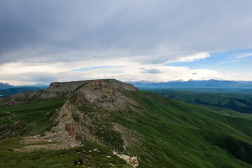 View of Elbrus and the Bermamyt plateau in the Karachay-Cherkess Republic, Russia. The Caucasus Mountains.