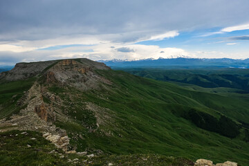 View of Elbrus and the Bermamyt plateau in the Karachay-Cherkess Republic, Russia. The Caucasus Mountains.