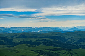 View of Elbrus and the Bermamyt plateau in the Karachay-Cherkess Republic, Russia. The Caucasus Mountains.