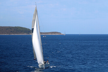 Obraz premium Sailing boat and beautiful Adriatic sea landscape in Croatia.