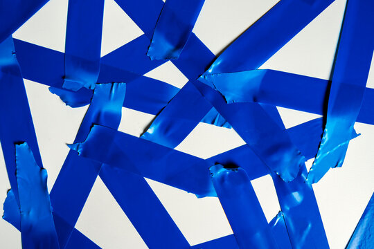 Torn Blue Sticky Tape Of Different Sizes Isolated On A White Background