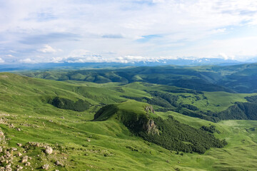 Fototapeta na wymiar View of Elbrus and the Bermamyt plateau in the Karachay-Cherkess Republic, Russia. The Caucasus Mountains.