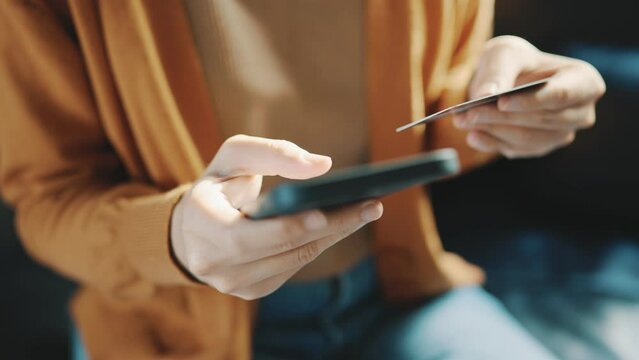 B roll - Hand of woman shopping online with credit card. Online banking with smart phone. Easy pay using smart phone or digital device. Communication via app for sale in shop.