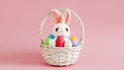 happy easter background cute rabbit toy and decorated eggs in wicker basket on pink background 