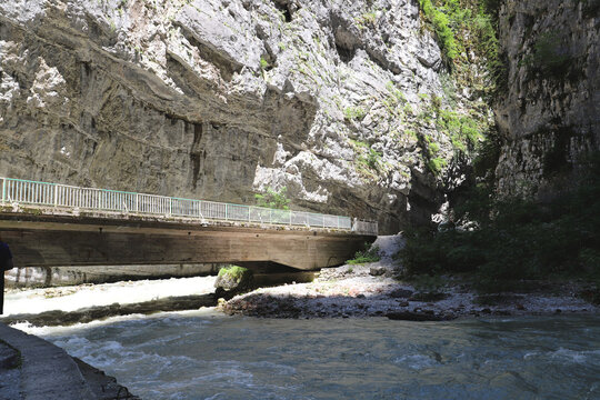 Abkhazia.May 27, 2021.Enchanting view of mountain bridge over Bzyb river.