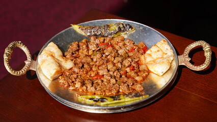 Photographs of roasting meat served on a tray.